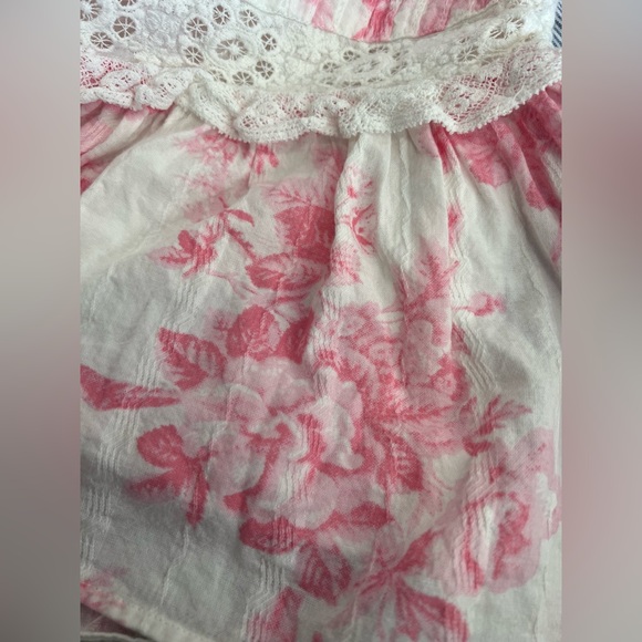 Love Shack Fancy Cove Miniskirt
White with pink floral design - Picture 5 of 9